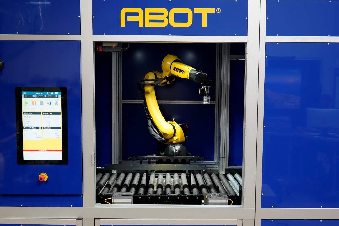 段ボール自動開梱機