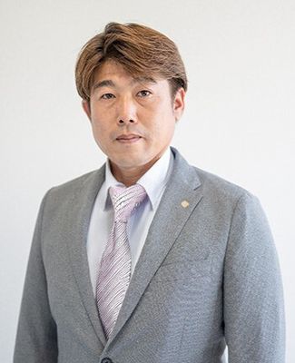 写真:取締役 溝口 正樹